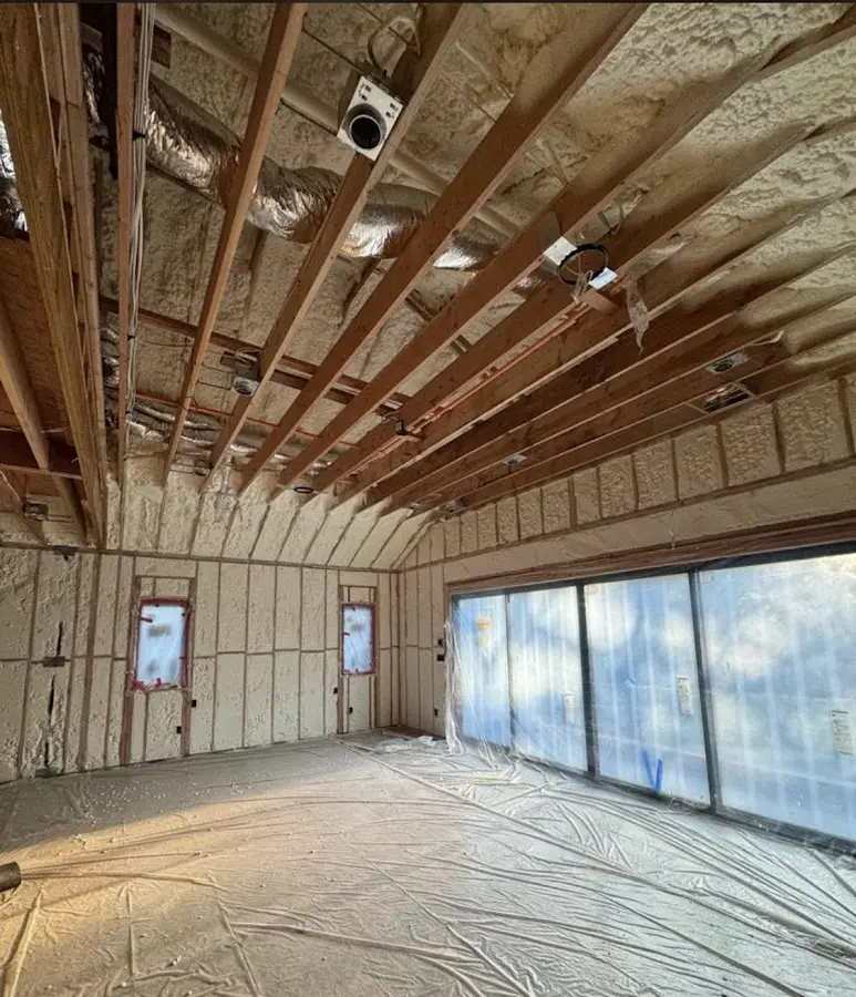 Interior walls and ceiling insulated with spray foam during new construction in Margate City